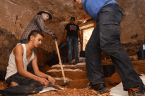 The excavation exposing steps in the bath