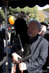 Sam Lipski holds the new Torah              pic courtesy Rabbi Klugwant