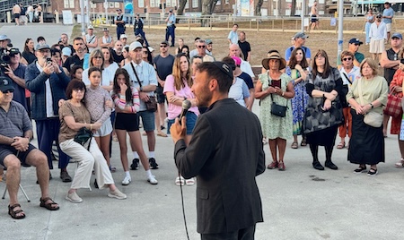 Rabbi Yossi Friedman leads a service at Bondi Beach