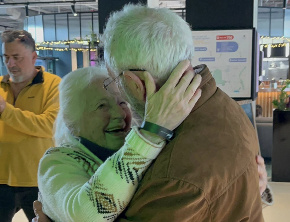 Reunited after 80 years, two child survivors light a memorial torch at Auschwitz
