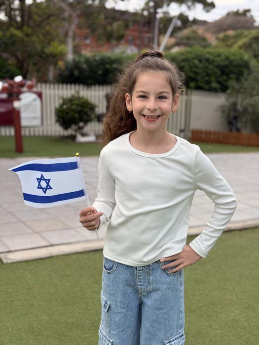 A child at Emanuel School in Sydney celebrates Yom Haatzma'ut