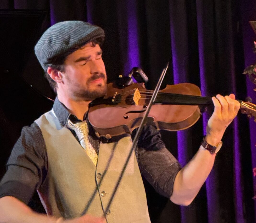 Ben Adler performing