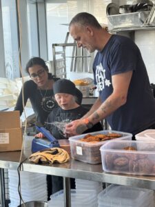 Ed works with some of the young bakers