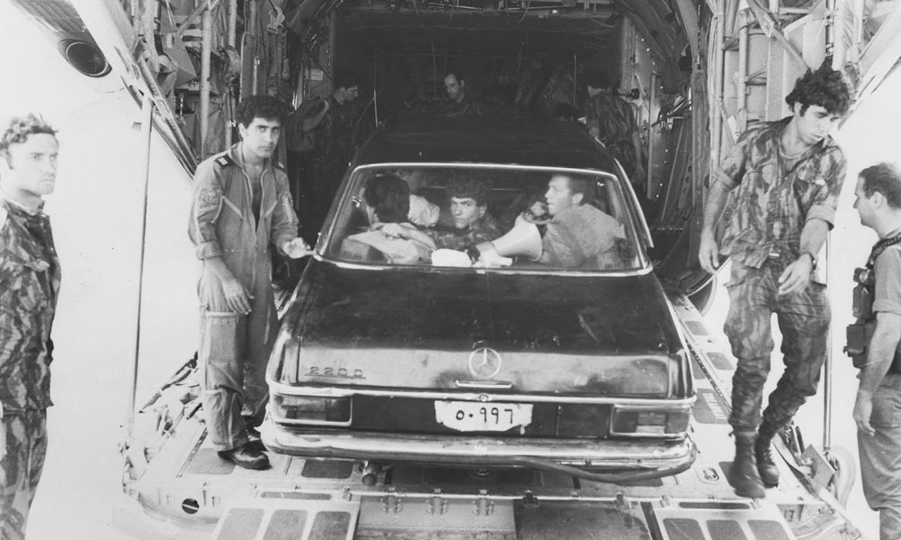 Commandos from Sayeret Matkal with the Mercedes they used to deceive the Ugandans (Photo IDF Spokesman).