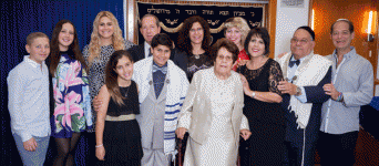 Ron Kotev with his proud family at Montefiore Homes Community Residence Shul