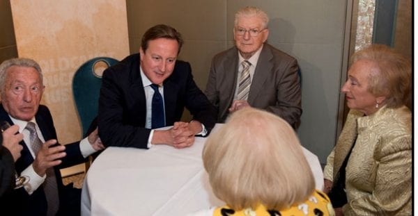 David Cameron with survivors