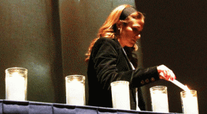 Efrat-Metzler-400-lighting-candle-for-CharlieShlushz'l