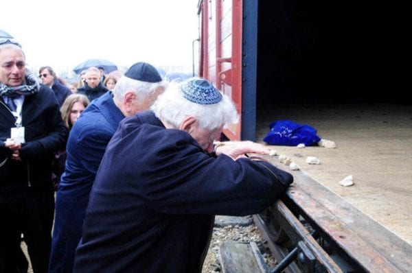 Alex and Frank Lowy and the wagon of Birkenau