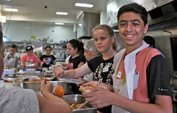 Enjoying helping Pic: Kids Giving Back