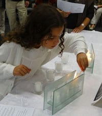 Jessica lights the memorial candles