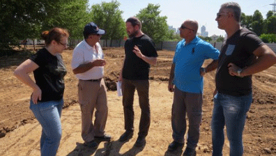 aDiscussing the development