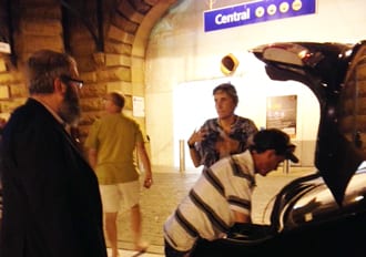 Shane and Teresa pack their things into Rabbi Kastel's vehicle