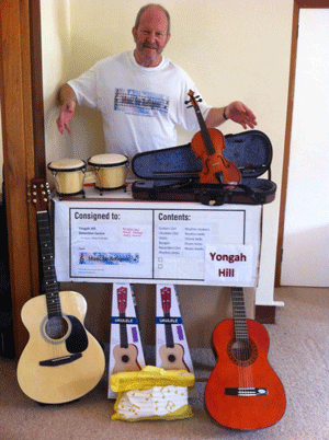 Philip Feinstein with instruments for refugees