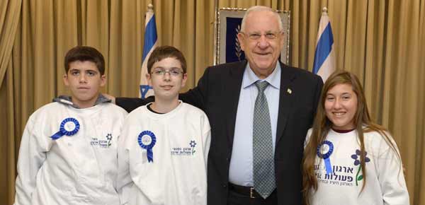 President Rivlin with Yigal Faizkov, Nadav Wollensky and Michelle Levine Photo: Mark Neyman