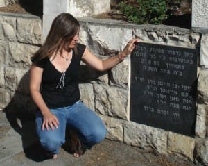 Carolyn examines the plaque