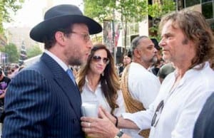 Ken Johnson receives his Yahrzeit candle Photo: Henry Benjamin/J-Wire
