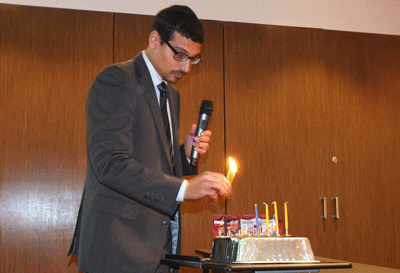 Manny Waks lights the Chanukah Photo: Toni Susskind/J-Wire